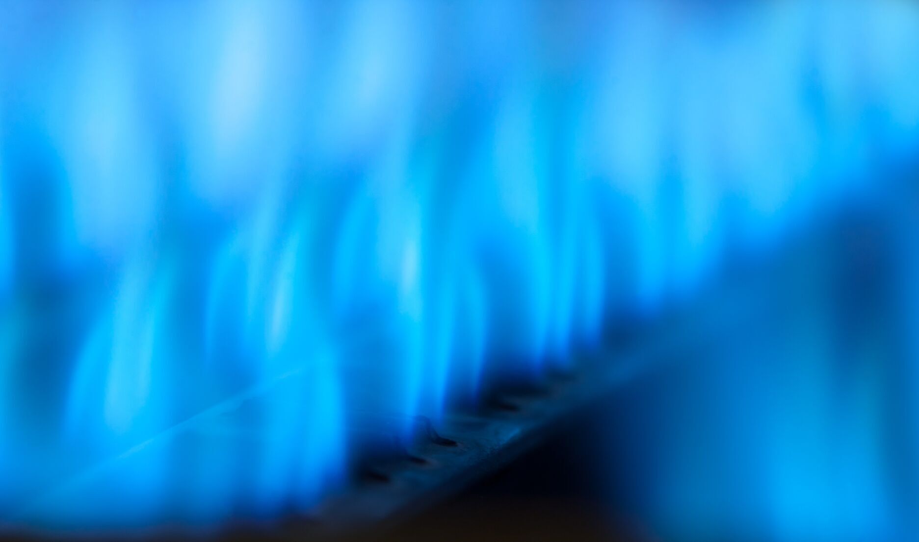Burning gas in water heater furnace